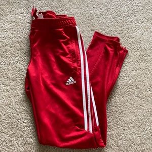 Red adidas pants